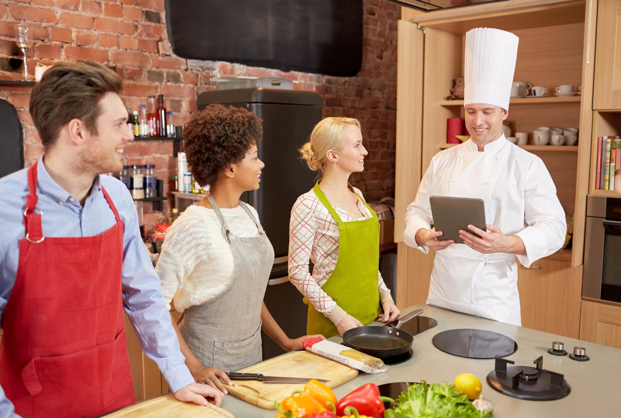 Workshop kitchen with instructor and students