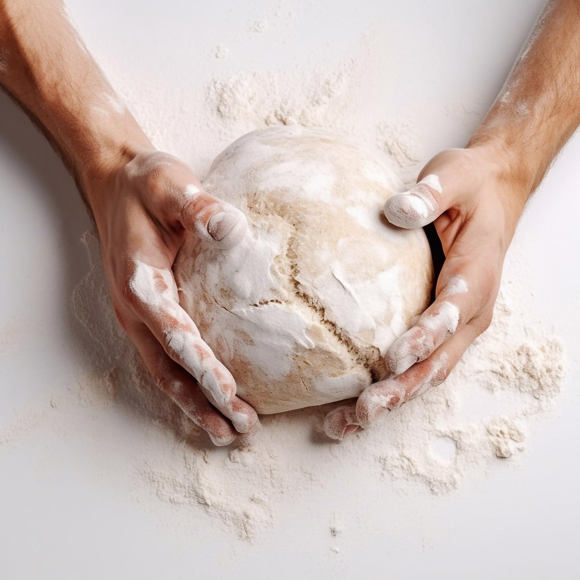 Chef forming artisanal bread